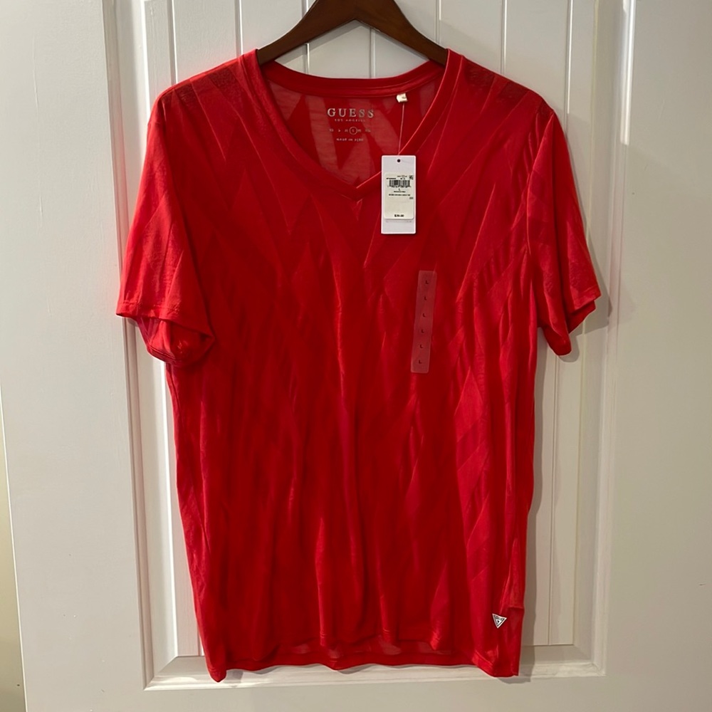 Guess red vneck tee. Geometric design with partly sheer fabric